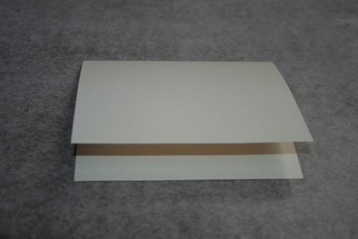 Make a greeting card from a cardstock base.  Cut 8 1/2 x 11 cardstock in half and fold.