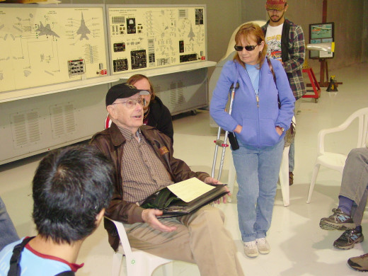 Dick Dinning addresses a small group with tales of piloting a B 17 over Germany in WW2