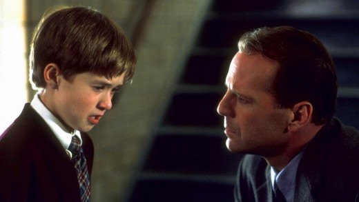Haley Joel Osment with Bruce Willis in The Sixth Sense (1999)