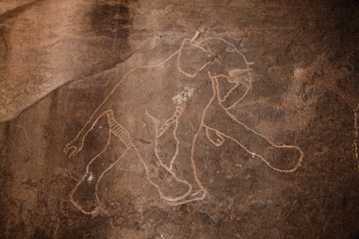 In Libya, you can find prehistoric rock carvings of mammoths. This image was probably drawn during extreme climatic transitions, in the Tadrart Acasus region of the country.