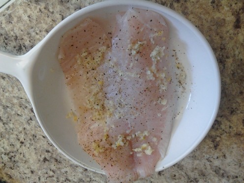 Marinate the tilapia in lime juice and garlic pepper for at least one hour.