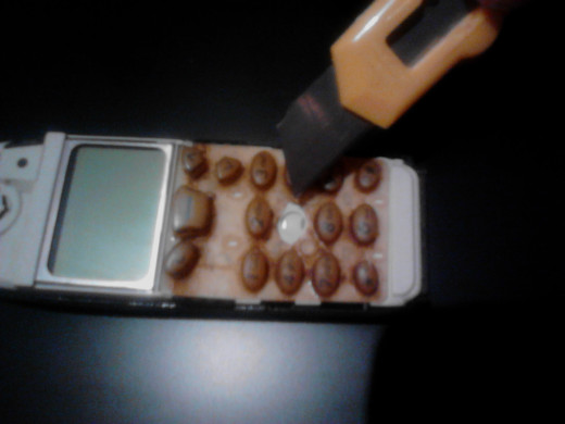 Place the rubber keys to the original position to see exactly where is the electronic taste #5.