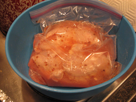 Marinate the chicken breasts for several hours in the fridge.