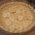 Peel and slice the bananas to cover the bottom of the baked crust Peel and slice the bananas to cover the bottom of the baked crust