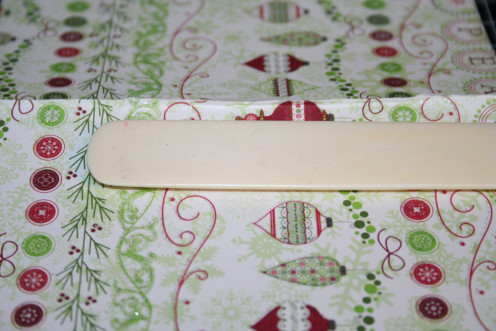 If you meet resistance when trying to fold card back after drawing paper is adhered, use a bone folder to make a smooth crease.