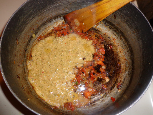 Put the grinded masala paste inside the pan.