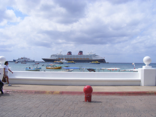 A Disney cruise ship docked in San Miguel, Cozumel. Almost one million cruise ship passengers sail through Cozumel, Mexico each year.