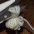 Cut the loops on one side of the tied bunch Cut the loops on one side of the tied bunch
