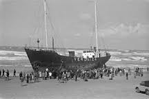 Ship of radio 'pirate' Veronica strands on the beach.