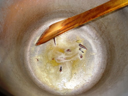 Ingredients are added inside the oil for frying.