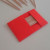 Carefully insert toothpicks into the origami case. Carefully insert toothpicks into the origami case.