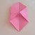 Bring the left and right corners to the centre line and press down to fold. Bring the left and right corners to the centre line and press down to fold.