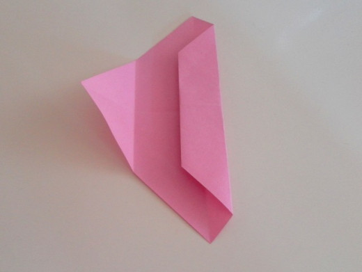 Unfold the flap on the left.