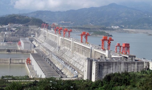 Spanning the Yangtze River, the world's largest hydroelectric river dam, when fully operational, will provide power and improve flood control. Its social costs included relocating a million people.