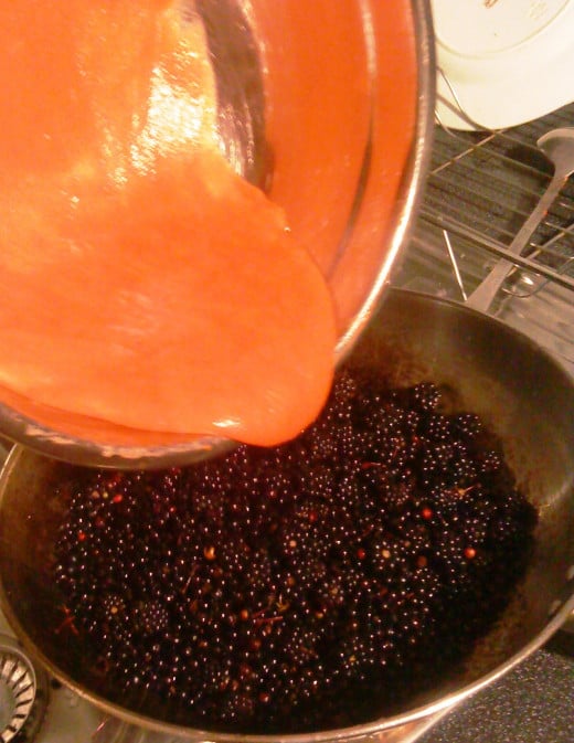 Combine strained jam with blackberries and elderberries.