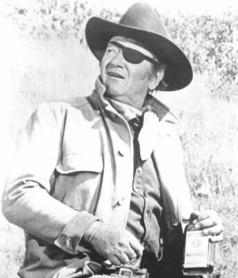 As Rooster Cogburn in True Grit