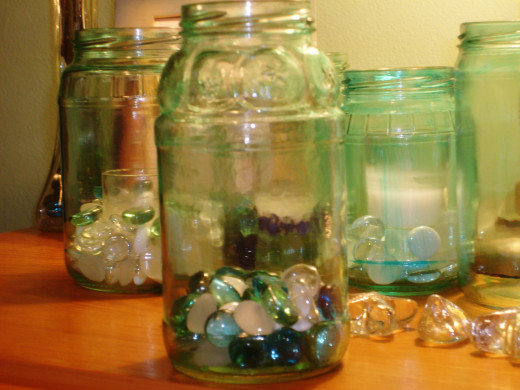 The jar in the forefront had extra water added to the paint while the jar just to the right had less water added and you can see a few streaks.  Without any water, you would see a lot more.  Again just add more food coloring for a darker paint. 
