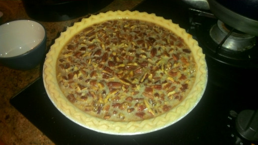 pie after pouring in filling, but before topping off with pecans