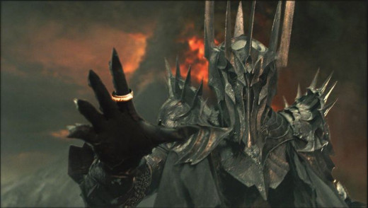 Sauron unfortunately couldn't be heard as he said: "Ok human, I've proven I'm the Lord of the  Bling! No hard feelings, eh? Let me help you up, to show my trust, I'll pull you up with my hand that has- "yeeeeow! That was my BLING finger you Bi-otch!