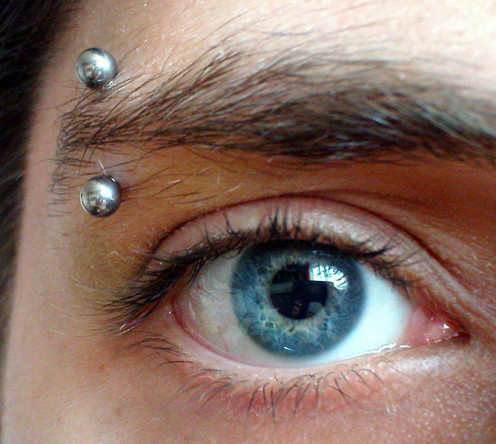 Good aftercare can hasten the healing process after an eyebrow piercing.