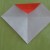 Unfold the paper. There is now a crease line on the top red flap. Unfold the paper. There is now a crease line on the top red flap.