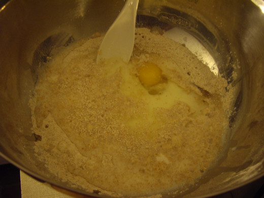 Stir in the egg, milk and oil