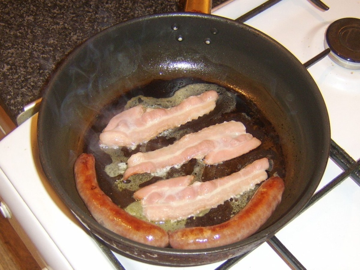 Frying sausages and bacon