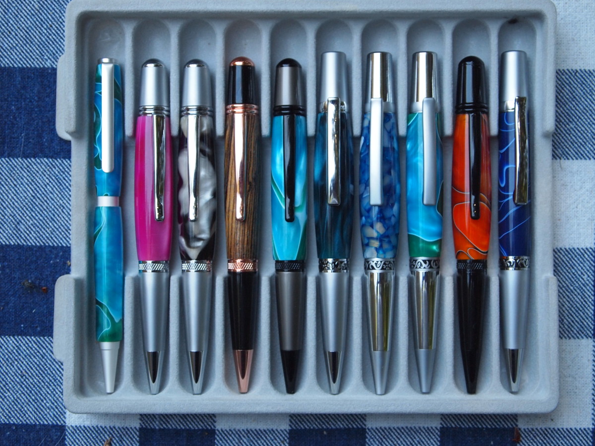 An assortment of ballpoint and gel pens I've made as a hobby for friends and purchasers, using a pen lathe, drill press, bandsaw, and other tools . 