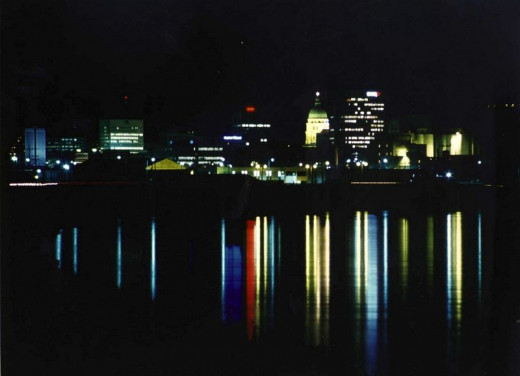 The nightly skyline of Topeka (Kansas) seems to reflect on the water the colours of Google. The city changed its name into "Google" for the month of March, 2010, to support Google's effort in the fiber experiment.