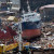 A cargo ship washed ashore by Typhoon Haiyan sits among the ruins A cargo ship washed ashore by Typhoon Haiyan sits among the ruins