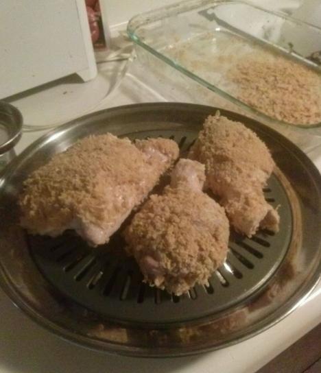 Leave a little room between each piece of chicken. As you can see on the right, I used a glass pan for my crushed flakes.