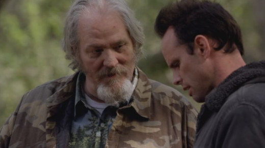 Bo (M.C. Gainey) and Boyd Crowder (Walton Goggins)