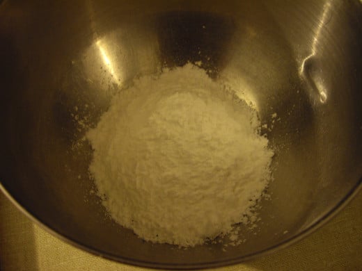 Add powdered sugar to a bowl