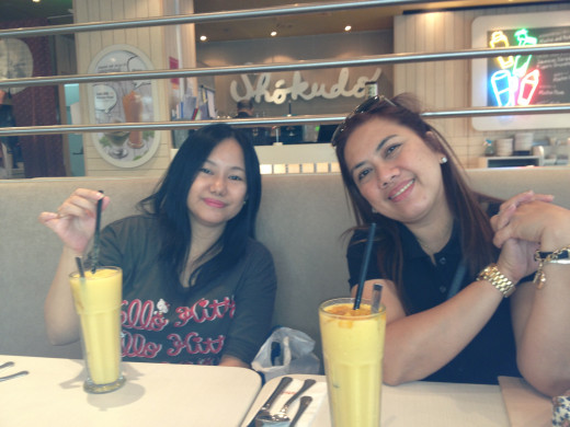 Friends enjoying the mango shake