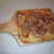 Japanese Pizza again in chopping board like tray 