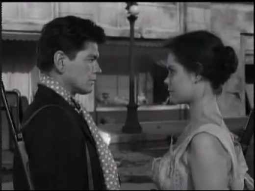 Charles Bronson as The Man and Elizabeth Montgomery as The Woman.