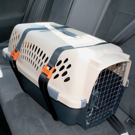 Kennel straps wrap around the carrier, and are then secured with the safety belt of the car.