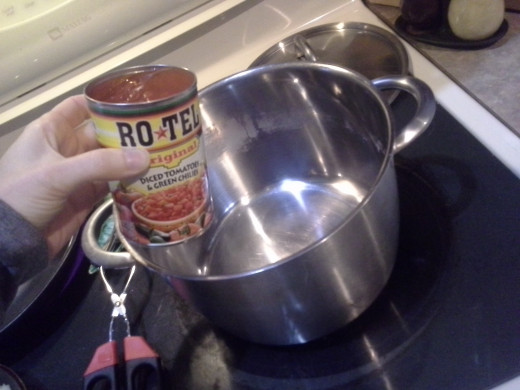 Step Three: In a large soup pot, add your can of Rotel