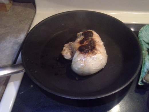 Step Four: Turn your chicken breast over and continue cooking
