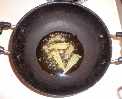 Cumin seeds are added for frying