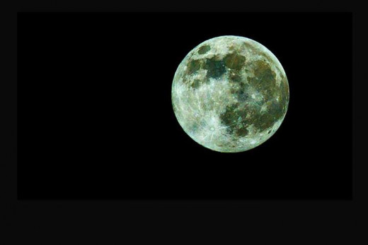 The original photo was too "Close Up" for my desired look in the FaceBook Cover Pic Panel.  So I "zoomed out" by creating a larger black background and repasting the pic into that larger frame.  I also "recentered" the moon- as Off-Center