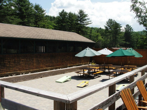 The Patio. This used to be an old, run down tennis court, that was later rebuilt to play backyard games.