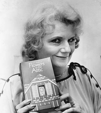 Cleo Virginia Andrews posing with her infamous novel, Flowers in the Attic.