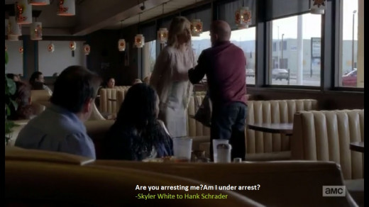 Skyler shouts at Hank in the restaurant