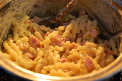 Mix the ham, cheese and cream of chicken soup together
