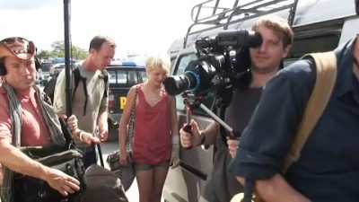 Gareth Edwards (with camera),  Whitney Able, (center), Scoot McNairy (at right edge), and some of his crew shooting Monsters