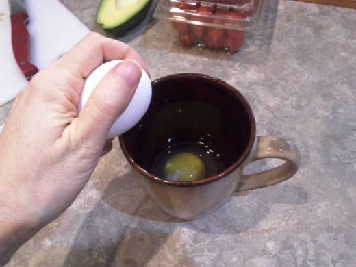 Step Eight: Crack your eggs in a small cup