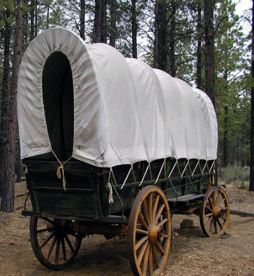 The covered farm wagon was still the transportaion of choice for distant moves