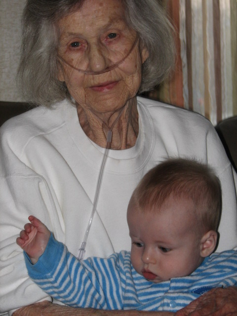 Holding Her First Great Grand Child With Love Her Eyes Speak For Themselves.