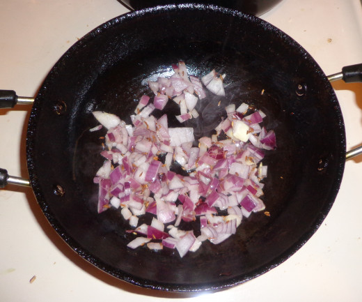 Onions are added for frying